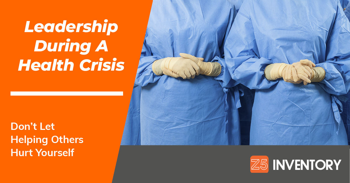 Clasped hands in PPE gloves indicate the need for healthcare leadership during a supply shortage.