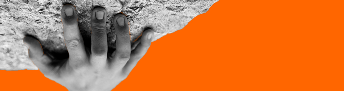 A Hand hanging from a cliff.