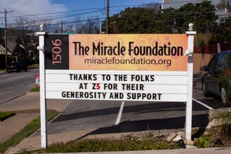 Miracle Foundation displays a marquee thanking Z5 Inventory for their 50 For 50 program donation.