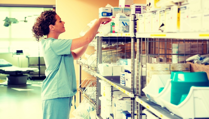 Nurse taking a physical inventory count. Stock photo.