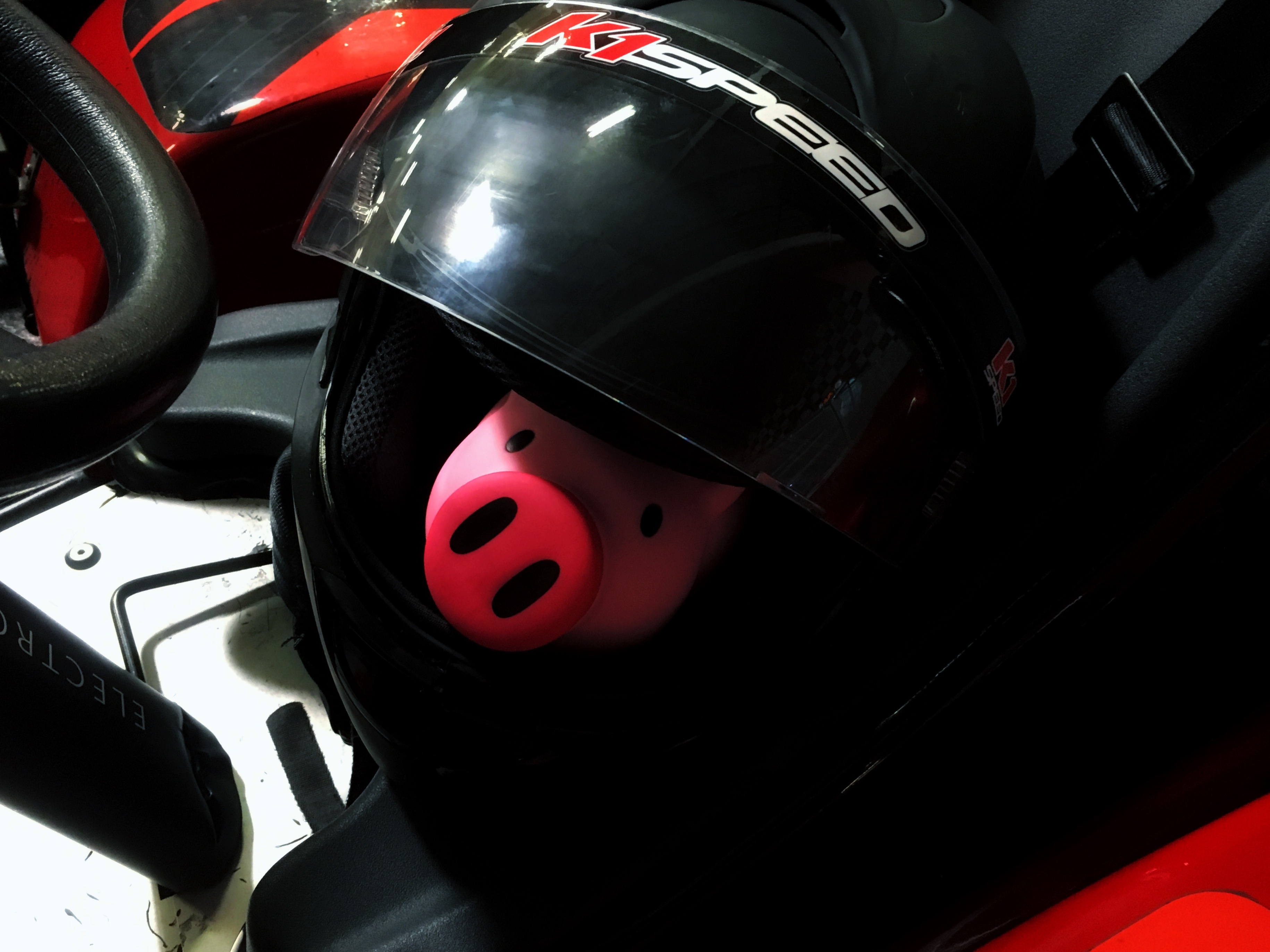 Pig Bank - In Helmet at K1 Speed